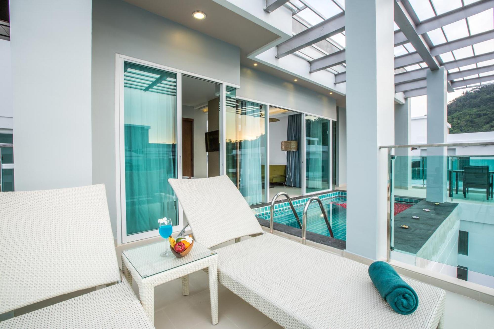 Fishermens Harbour Urban Resort - Sha Extra Plus Patong Room photo